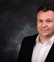 Travis Carmichael, REALTOR<sup>®</sup>